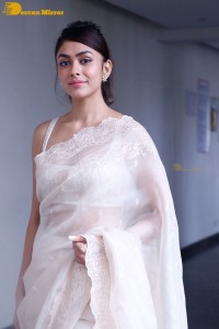 Actress Mrunal Thakur in a white saree