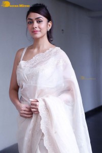 Actress Mrunal Thakur in a white saree