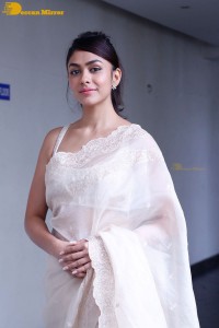 Actress Mrunal Thakur in a white saree