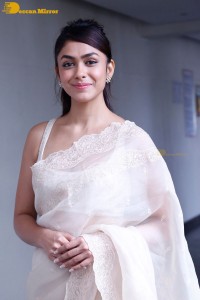 Actress Mrunal Thakur in a white saree
