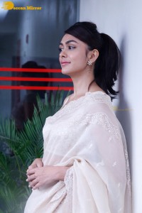 Actress Mrunal Thakur in a white saree