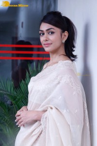 Actress Mrunal Thakur in a white saree