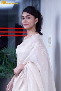 Actress Mrunal Thakur in a white saree