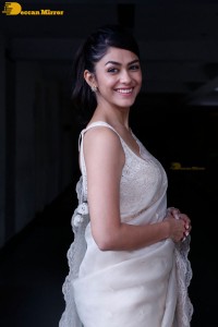 Actress Mrunal Thakur in a white saree