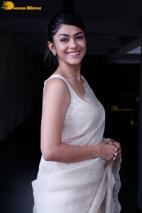 Actress Mrunal Thakur in a white saree