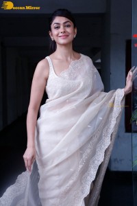 Actress Mrunal Thakur in a white saree