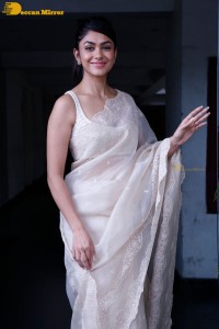 Actress Mrunal Thakur in a white saree
