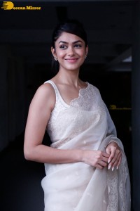 Actress Mrunal Thakur in a white saree