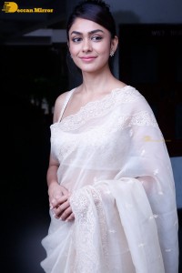 Actress Mrunal Thakur in a white saree
