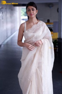 Actress Mrunal Thakur in a white saree