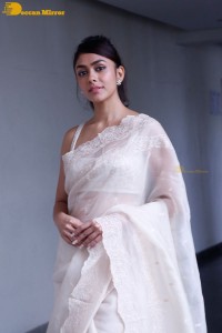 Actress Mrunal Thakur in a white saree