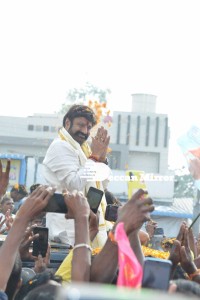 Nandamuri Balakrishna and Boyapati Srinu offer prayers at Pedakakani temple and fans throng to see them outside