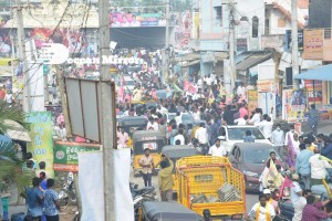 Nandamuri Balakrishna and Boyapati Srinu offer prayers at Pedakakani temple and fans throng to see them outside