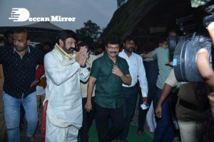Balakrishna Nandamuri and Boyapati Srinu in Vijayawada to pray at the Temple for Akhanda movie success. Fans throng to see them.