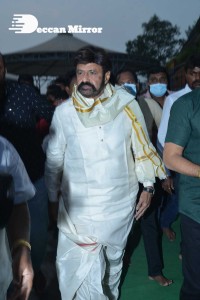 Balakrishna Nandamuri and Boyapati Srinu in Vijayawada to pray at the Temple for Akhanda movie success. Fans throng to see them.