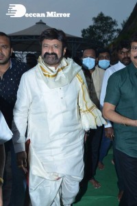 Balakrishna Nandamuri and Boyapati Srinu in Vijayawada to pray at the Temple for Akhanda movie success. Fans throng to see them.