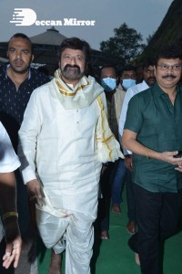 Balakrishna Nandamuri and Boyapati Srinu in Vijayawada to pray at the Temple for Akhanda movie success. Fans throng to see them.