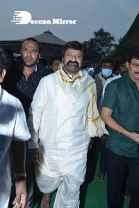 Balakrishna Nandamuri and Boyapati Srinu in Vijayawada to pray at the Temple for Akhanda movie success. Fans throng to see them.