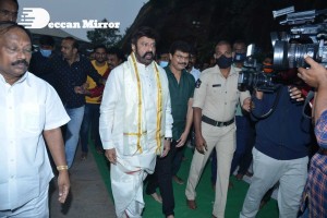 Balakrishna Nandamuri and Boyapati Srinu in Vijayawada to pray at the Temple for Akhanda movie success. Fans throng to see them.