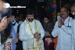 Balakrishna Nandamuri and Boyapati Srinu in Vijayawada to pray at the Temple for Akhanda movie success. Fans throng to see them.