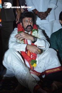 Balakrishna Nandamuri and Boyapati Srinu in Vijayawada to pray at the Temple for Akhanda movie success. Fans throng to see them.