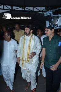Balakrishna Nandamuri and Boyapati Srinu in Vijayawada to pray at the Temple for Akhanda movie success. Fans throng to see them.
