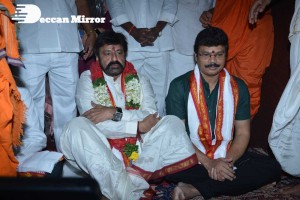 Balakrishna Nandamuri and Boyapati Srinu in Vijayawada to pray at the Temple for Akhanda movie success. Fans throng to see them.