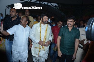 Balakrishna Nandamuri and Boyapati Srinu in Vijayawada to pray at the Temple for Akhanda movie success. Fans throng to see them.