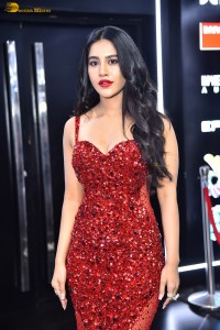 actress Nabha Natesh dazzles in a shiny red dress