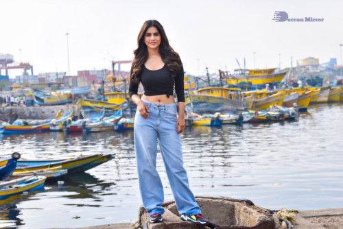 Telugu Actress Nabha Natesh in a black top and blue jeans