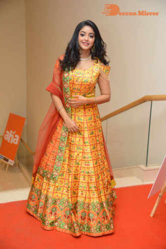 Telugu Actress Nakshatra photoshoot in a yellow Lehenga Choli dress
