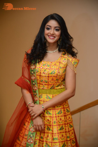 Telugu Actress Nakshatra photoshoot in a yellow Lehenga Choli dress