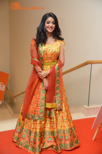 Telugu Actress Nakshatra photoshoot in a yellow Lehenga Choli dress