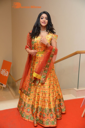 Telugu Actress Nakshatra photoshoot in a yellow Lehenga Choli dress