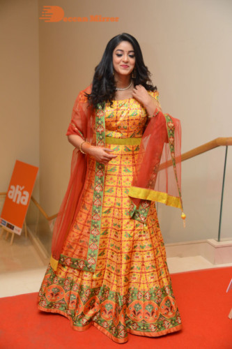 Telugu Actress Nakshatra photoshoot in a yellow Lehenga Choli dress