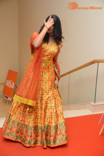 Telugu Actress Nakshatra photoshoot in a yellow Lehenga Choli dress