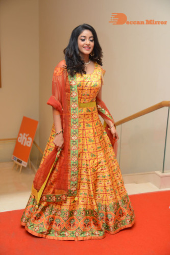 Telugu Actress Nakshatra photoshoot in a yellow Lehenga Choli dress