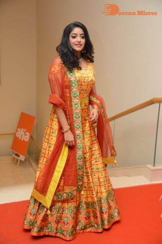 Telugu Actress Nakshatra photoshoot in a yellow Lehenga Choli dress