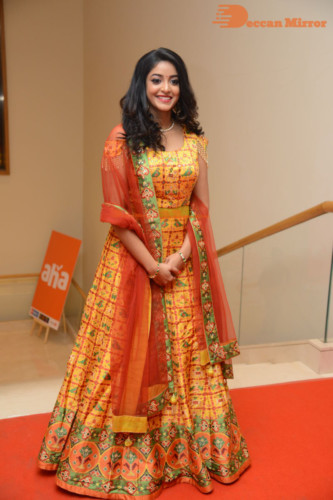 Telugu Actress Nakshatra photoshoot in a yellow Lehenga Choli dress