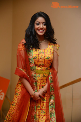 Telugu Actress Nakshatra photoshoot in a yellow Lehenga Choli dress