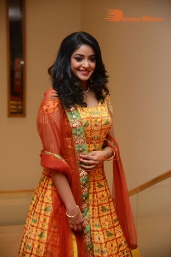 Telugu Actress Nakshatra photoshoot in a yellow Lehenga Choli dress