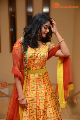 Telugu Actress Nakshatra photoshoot in a yellow Lehenga Choli dress