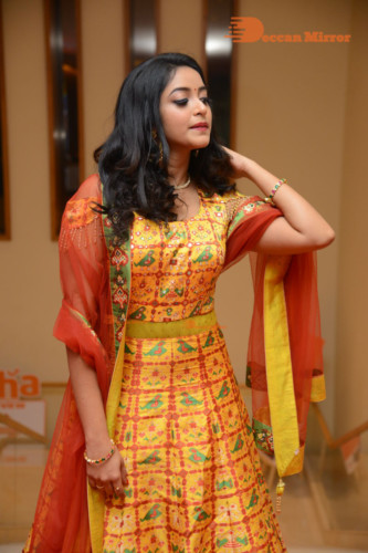 Telugu Actress Nakshatra photoshoot in a yellow Lehenga Choli dress