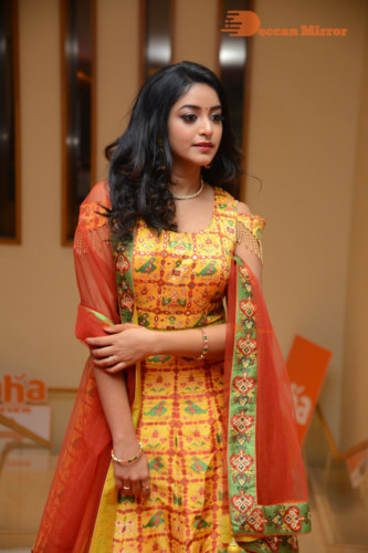 Telugu Actress Nakshatra photoshoot in a yellow Lehenga Choli dress