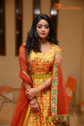 Telugu Actress Nakshatra photoshoot in a yellow Lehenga Choli dress