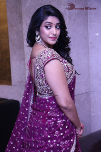 Telugu Actress Nakshatra photoshoot in a maroon saree