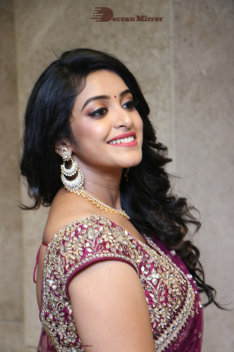 Telugu Actress Nakshatra photoshoot in a maroon saree