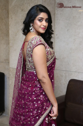 Telugu Actress Nakshatra photoshoot in a maroon saree