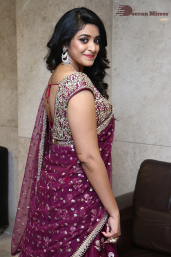 Telugu Actress Nakshatra photoshoot in a maroon saree