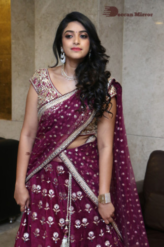 Telugu Actress Nakshatra photoshoot in a maroon saree